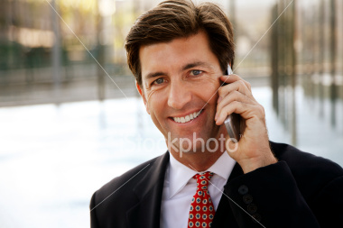 ist2_4748268_businessman_talking_on_cellphone.jpg